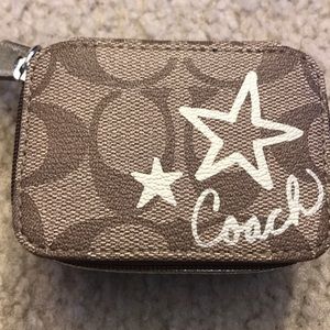 Coach travel pill box